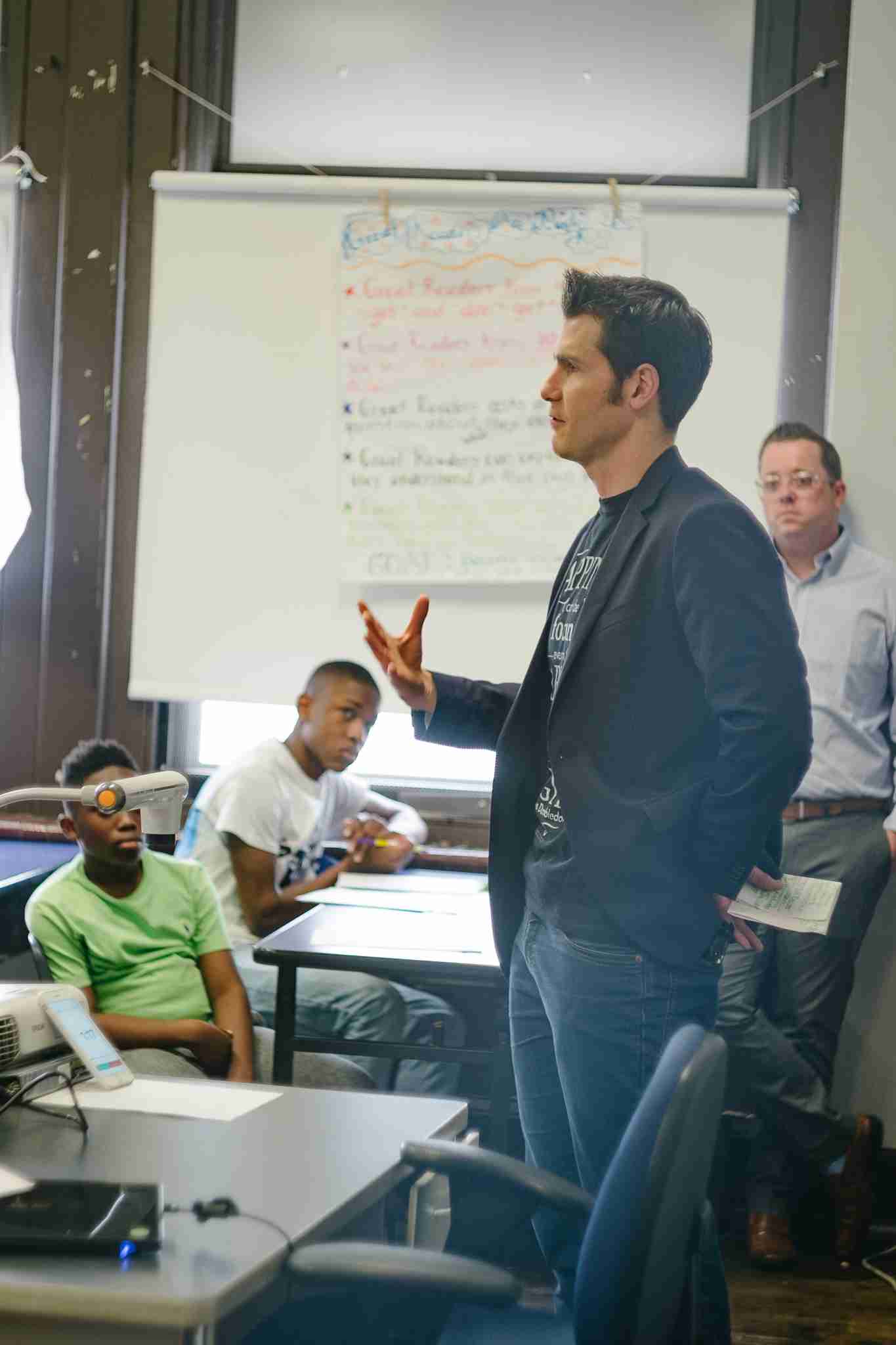 Matt talking to a class of kids