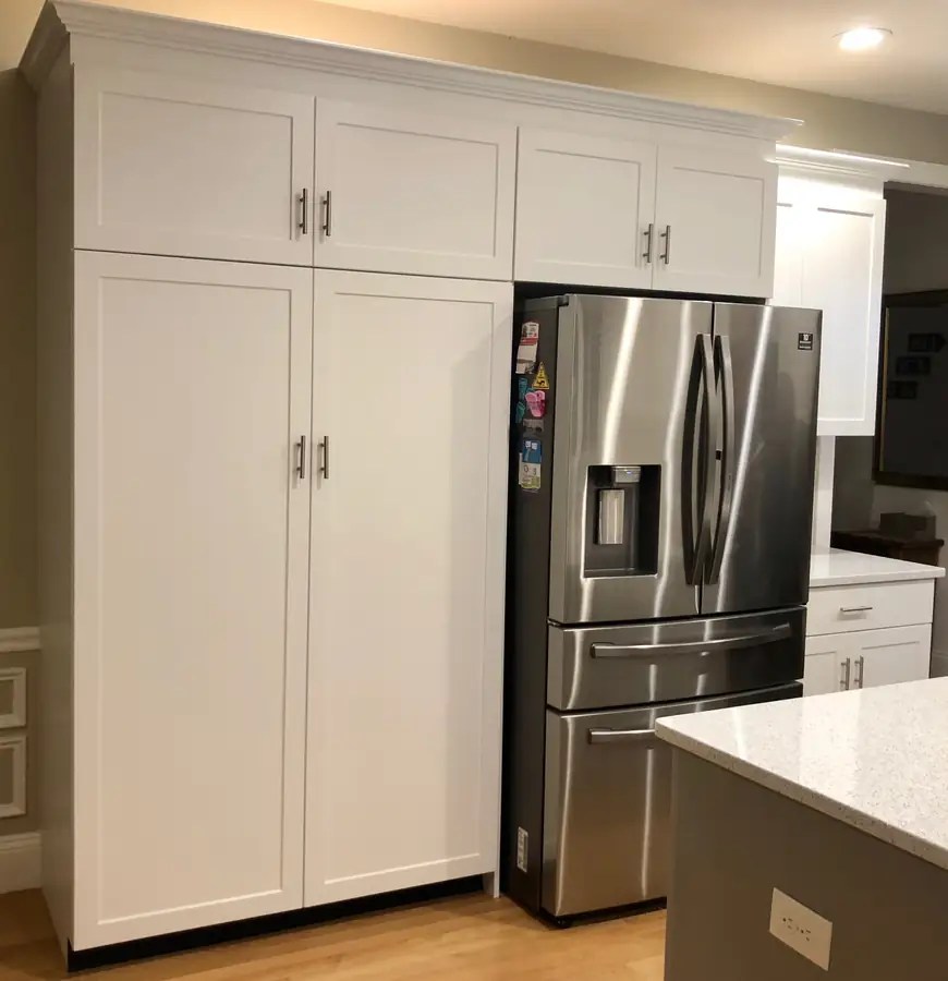 Pantry area after custom white cabinets installed