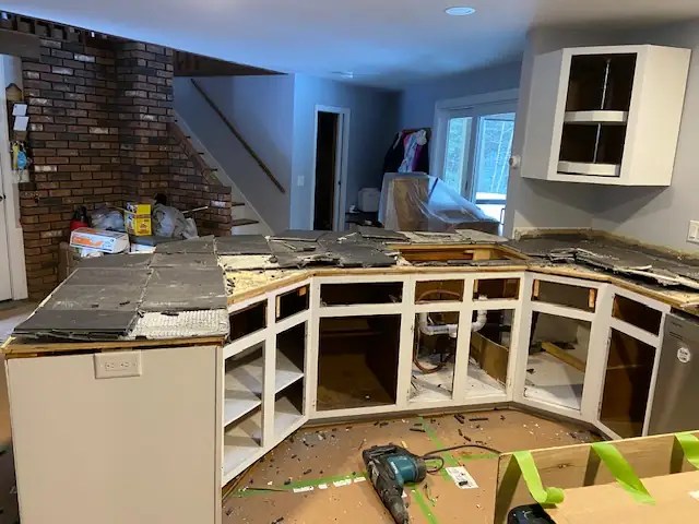 Kitchen cabinet boxes prepared and covered with new material
