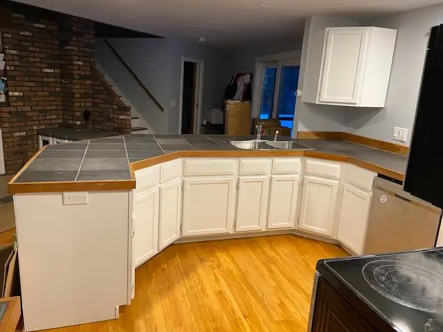 Finished kitchen with newly installed cabinet doors