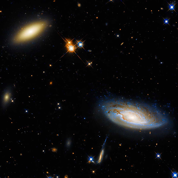 Dupla chama a atenção em foto espetacular do telescópio Hubble Dupla chama a atenção em foto espetacular do telescópio Hubble