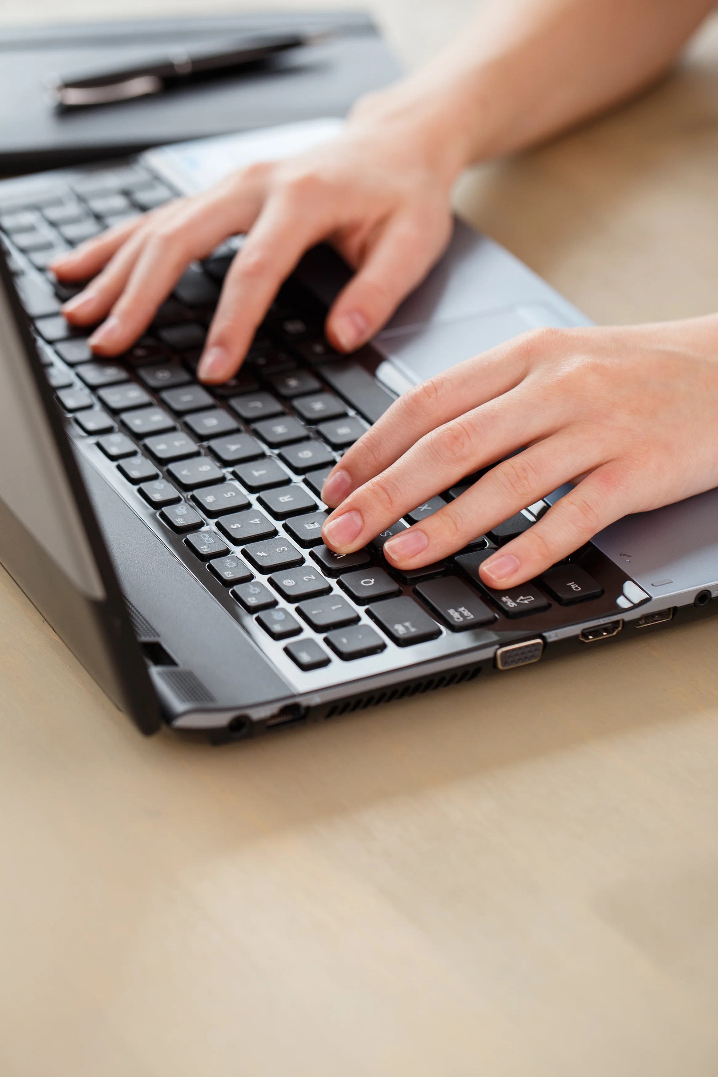 close up laptop, woman's hands