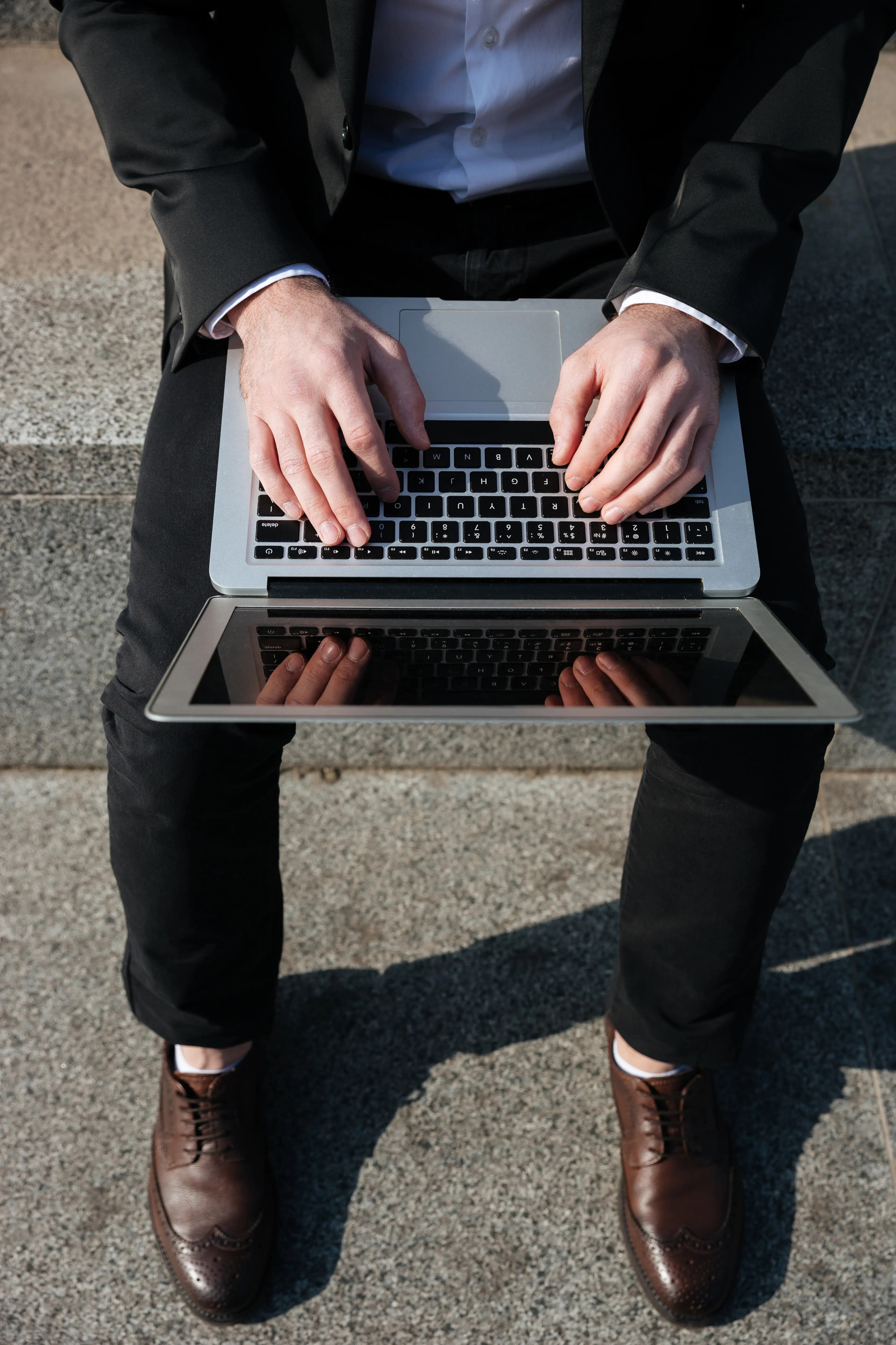 Point to Point Connections Businessman using laptop close up