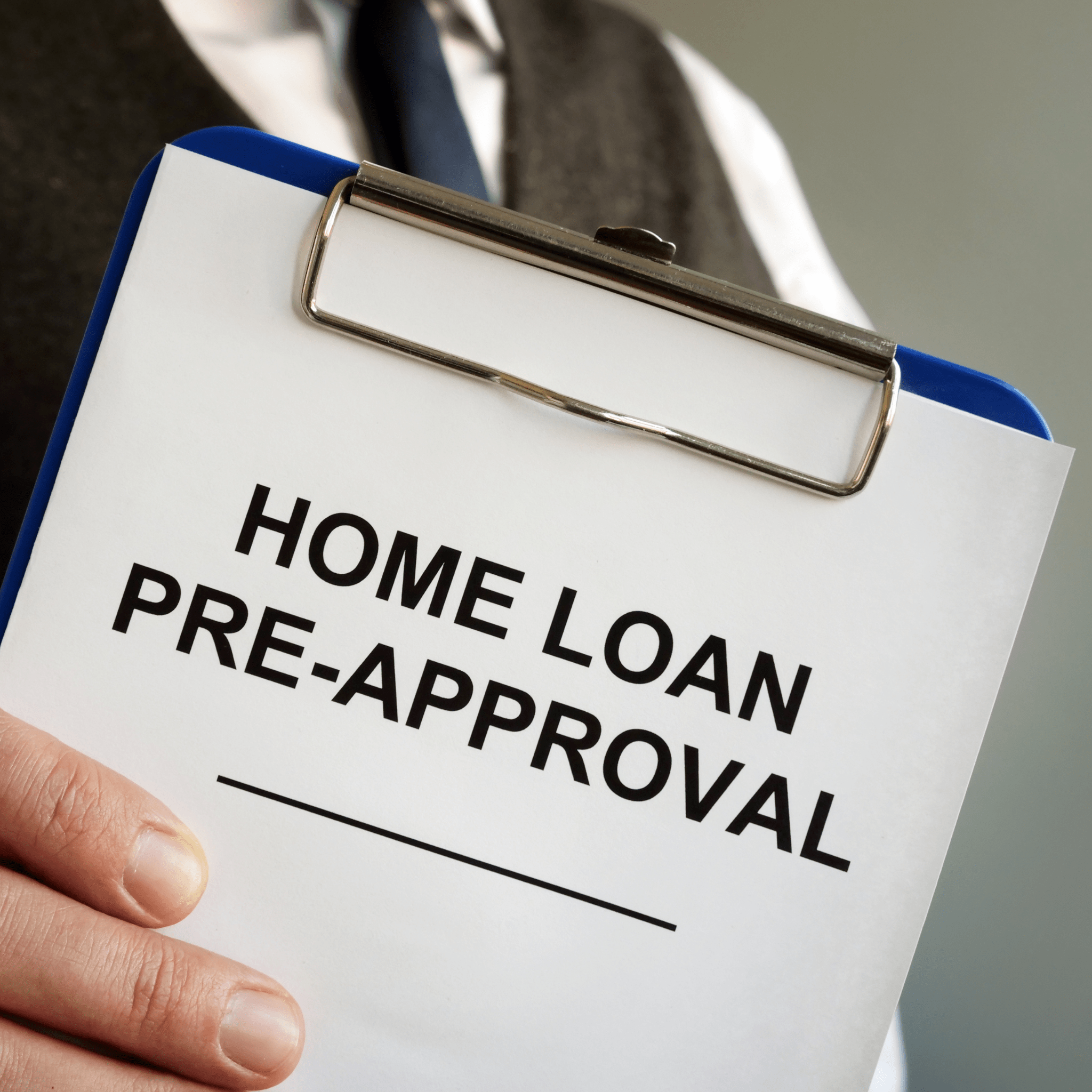 Man holding a notice of home loan pre-approval