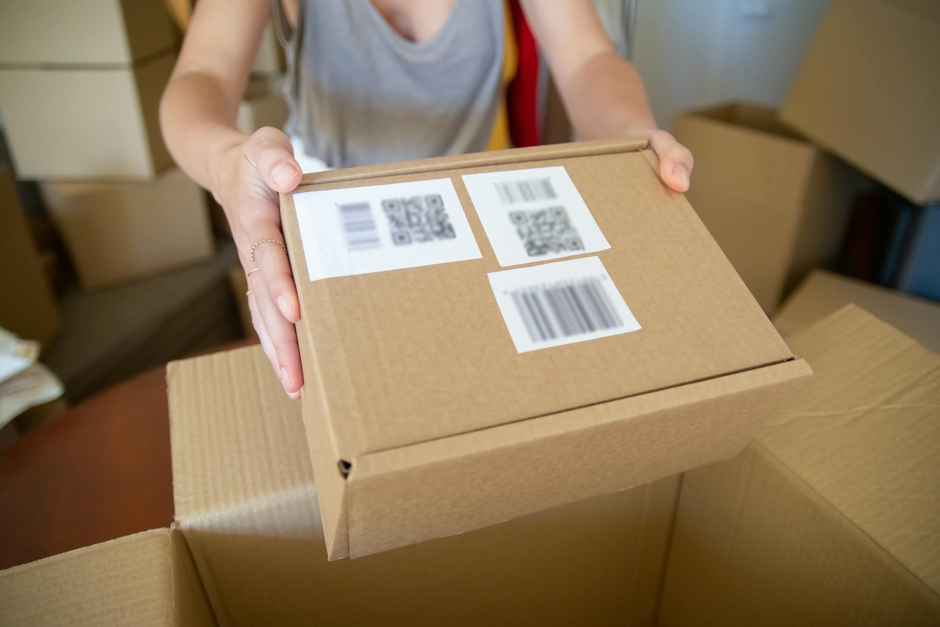 carton box held by a person