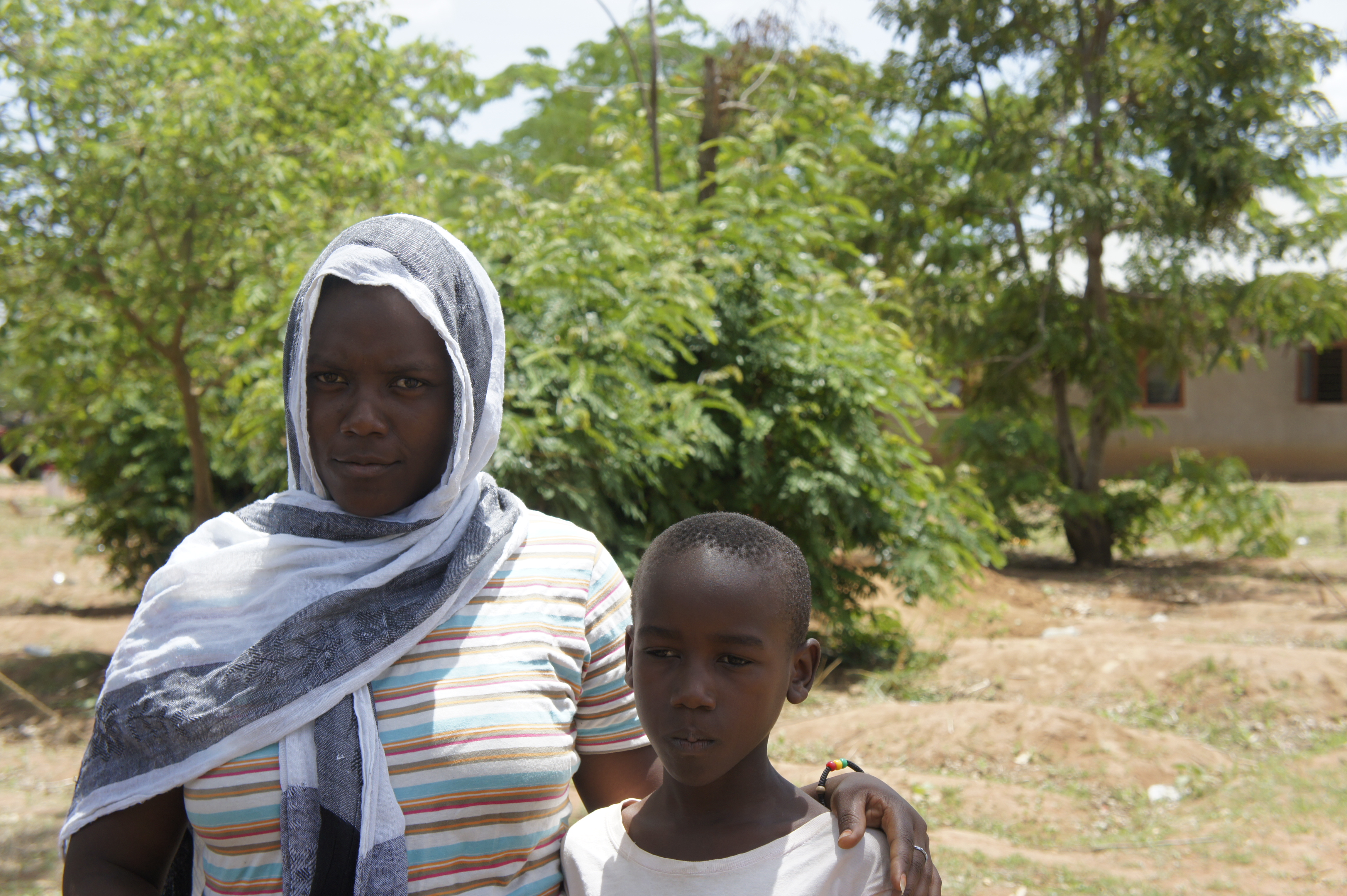 Brother and sister at male circumcision appointment in Tanzania