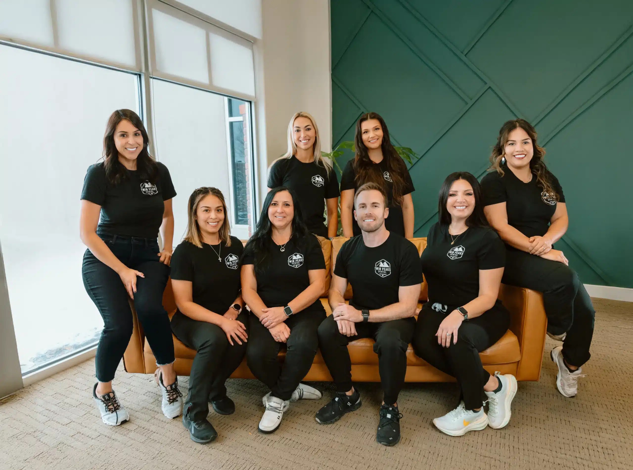 Team Photo Twin Peaks Family & Cosmetic Dentistry in Longmont, CO, offering comprehensive dental care, including cosmetic services like crowns and implants, with a focus on patient health and creating beautiful smiles in a welcoming environment.