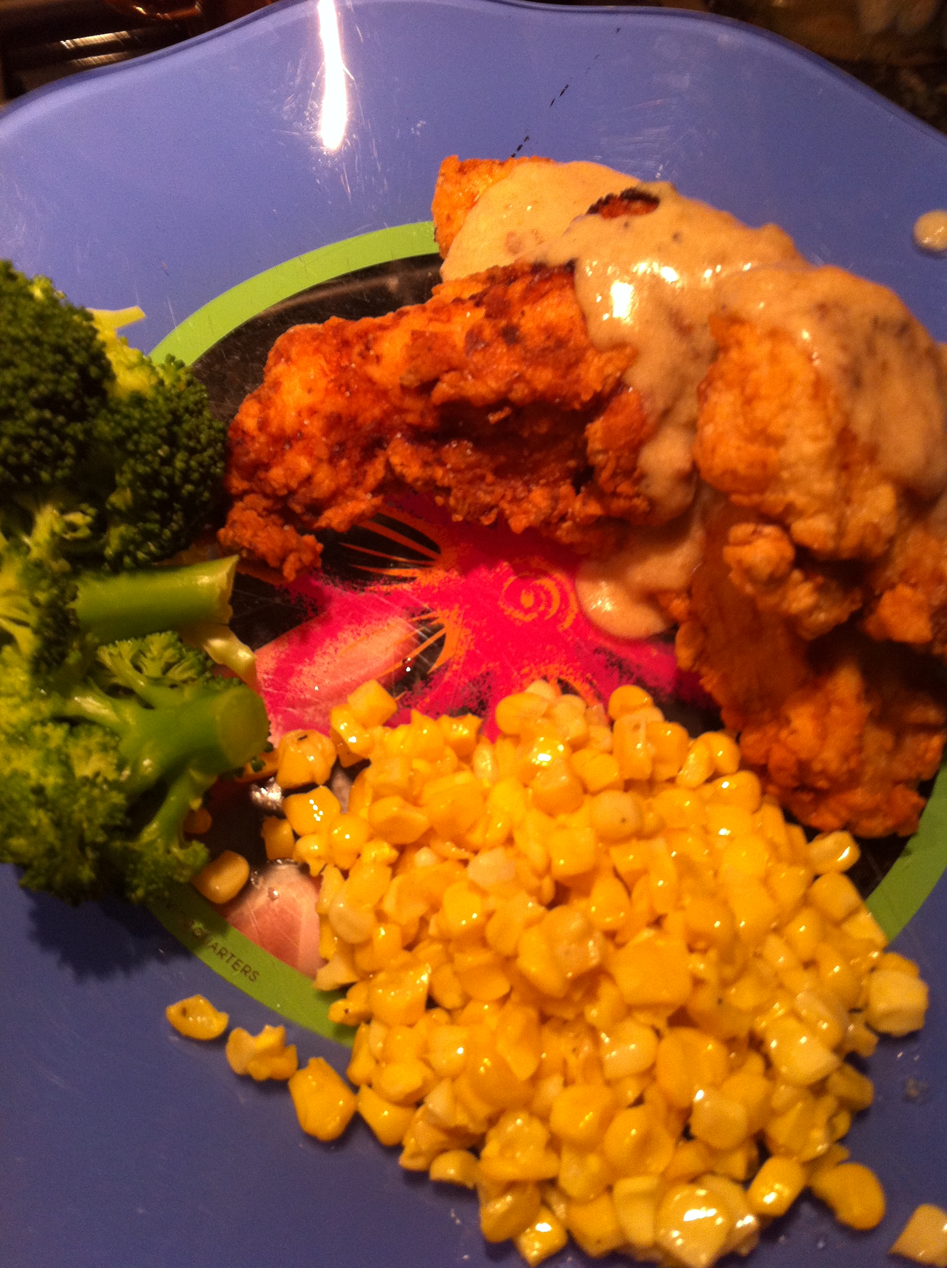 Fried chicken and homemade gravy, skillet corn and steamed broccoli