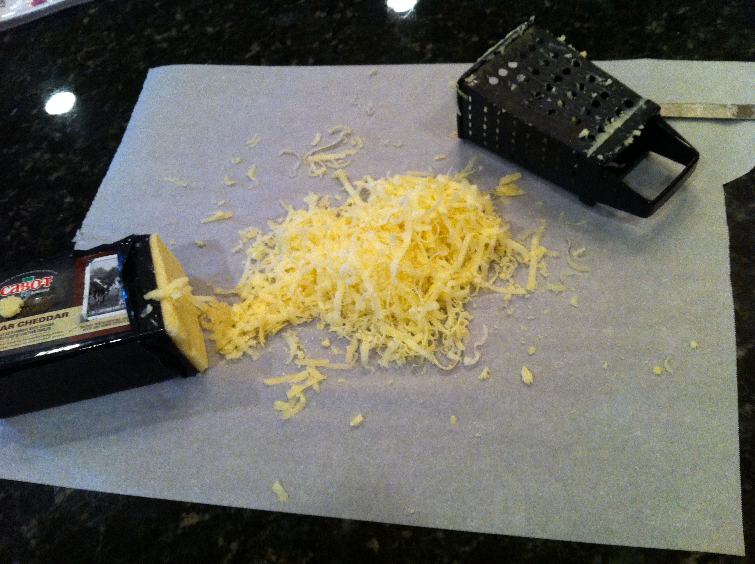 Grating cheese with a box grater