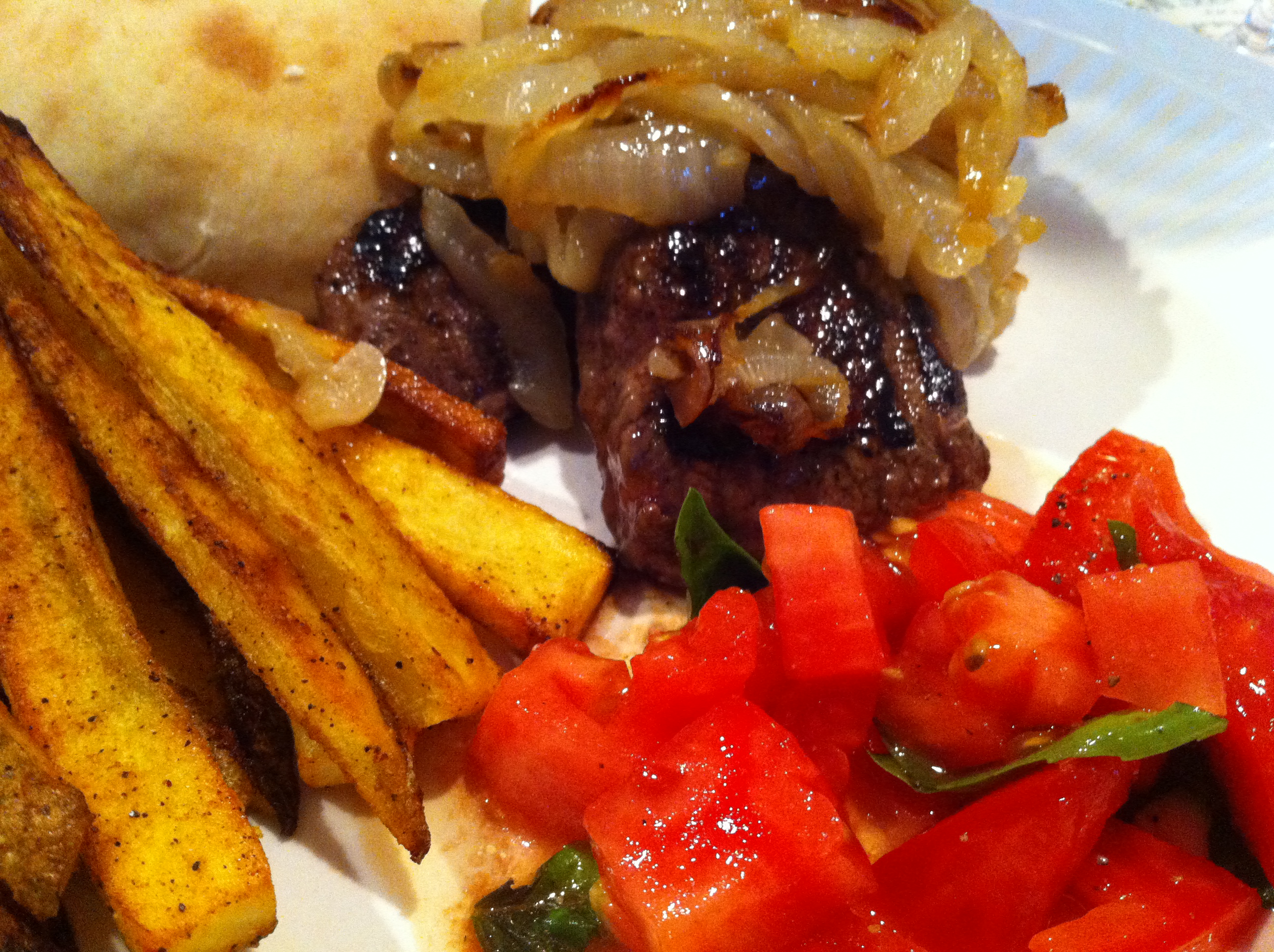 Pan seared steak with caramelized onions and homemade oven fries – in less than 45 minutes!
