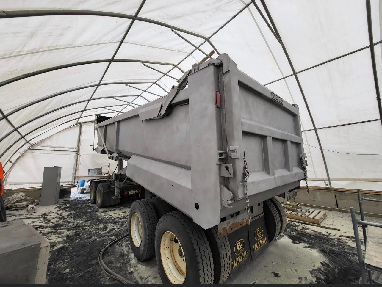 Class 8 dump trailer dustless blasted down to bare metal by McConnell Sandblasting