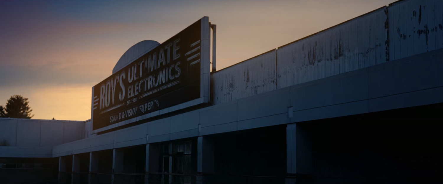 Daytime exterior of Roy's Ultimate Electronics.