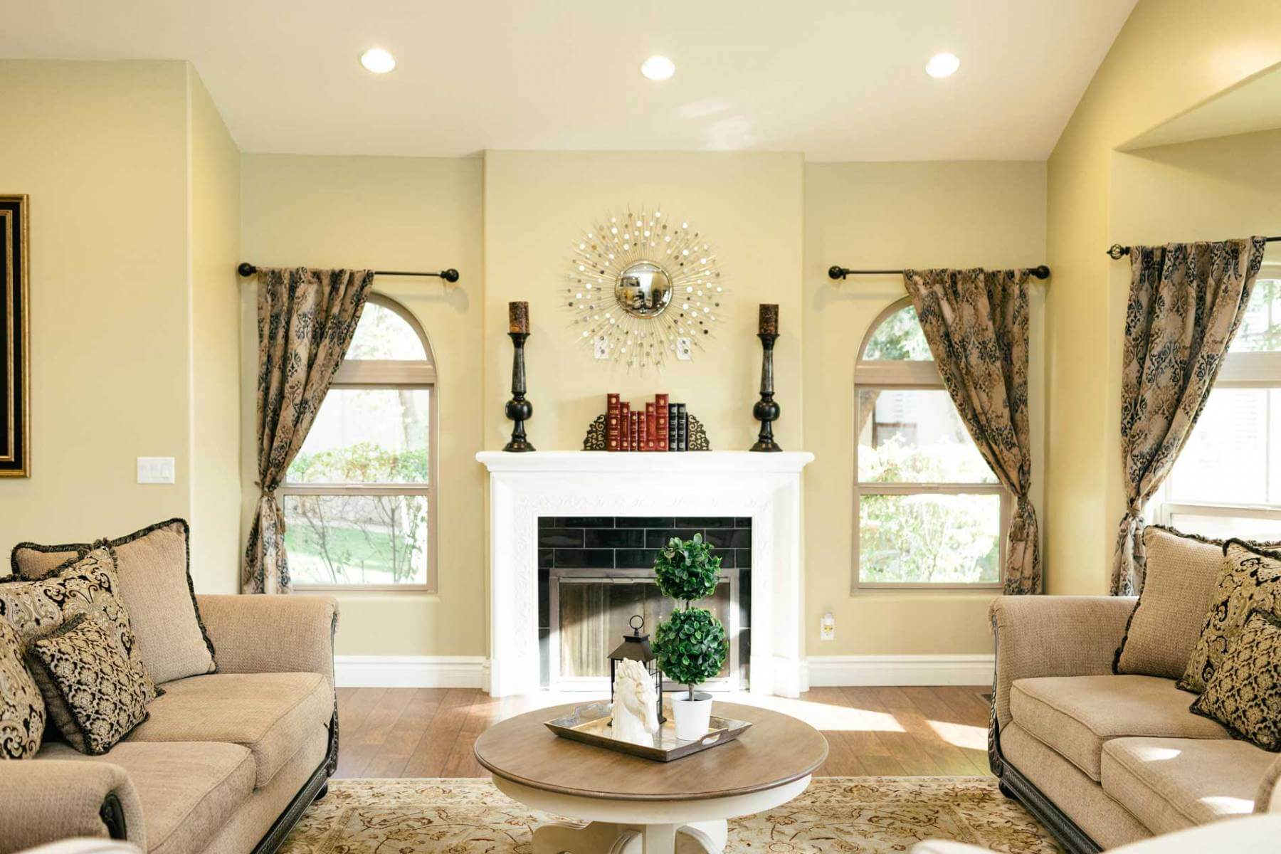 Two couches living room with a fireplace