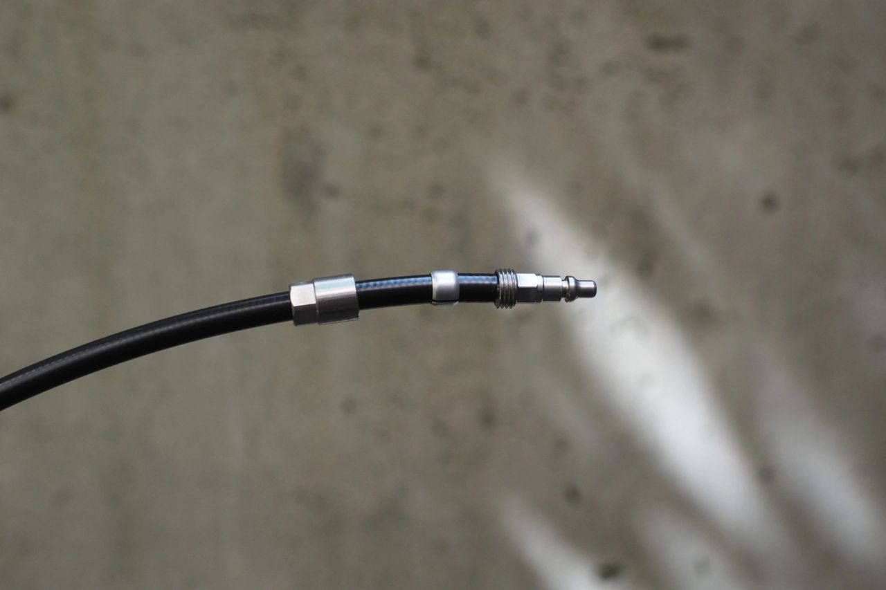The same idea as assembling a new nut, barb, and olive into a primary cylinder, except all the action happens on the brake line, and then the Easy Link fitting is clipped into place. 