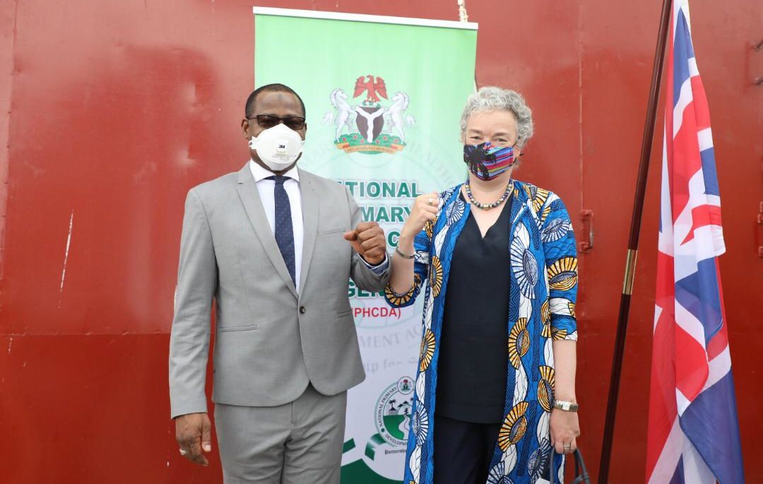 The Executive Director of the National Primary Health Care Development Agency (NPHCDA) Faisal Shuaib and the Acting British High Commissioner to Nigeria, Gill Atkinson at the unveiling of the 699,760 doses of Oxford AstraZeneca COVID-19 vaccines donated to Nigeria by the UK government