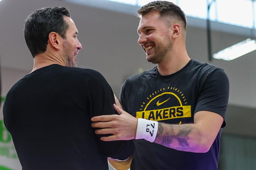 Lakers' Luka Doncic easing into training camp after hectic offseason