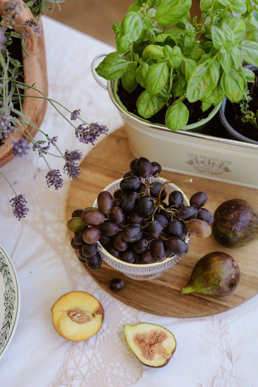 fresh summer fruits and herbs on wooden board