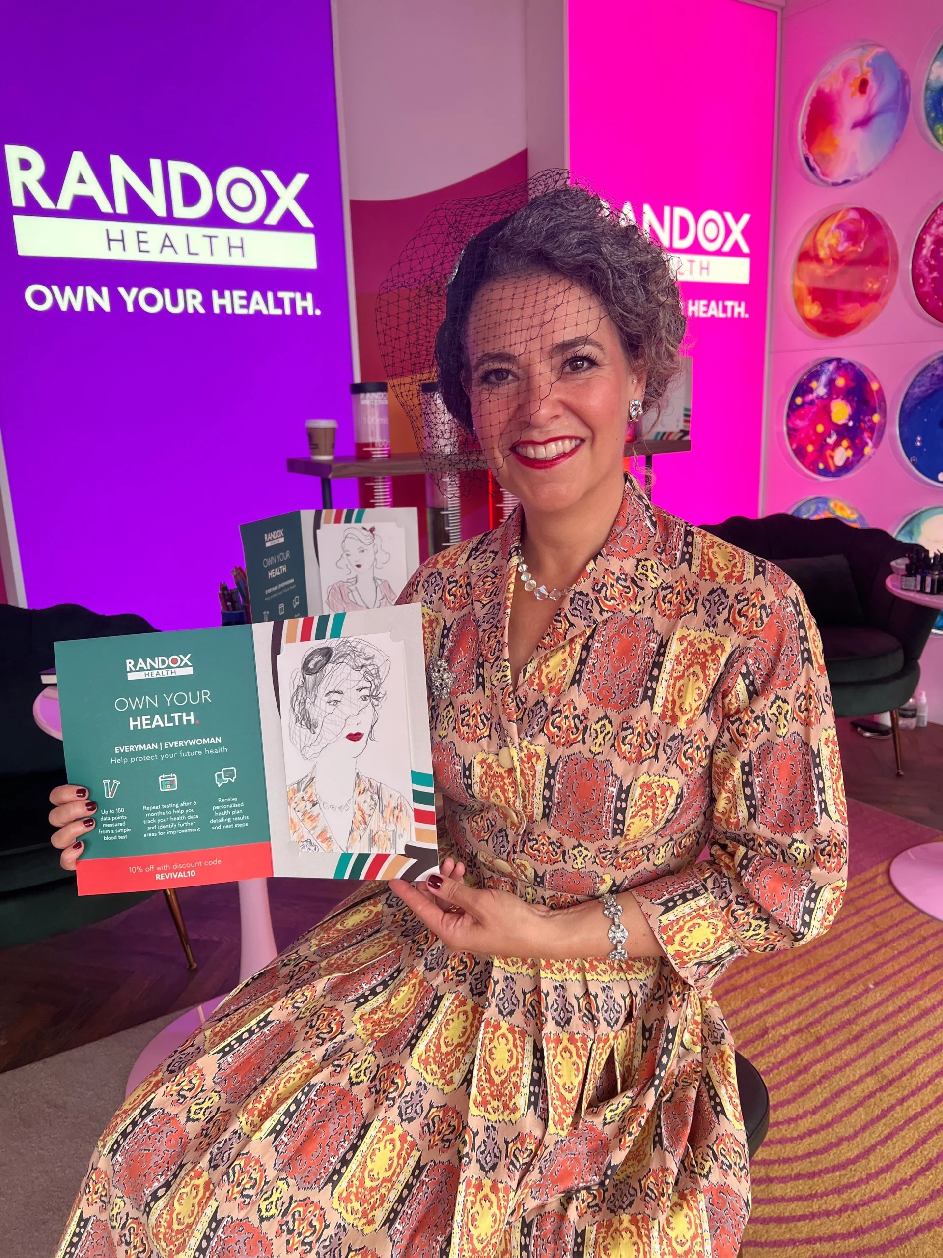 live portrait guest holding their personalised portrait illustration by megan st clair