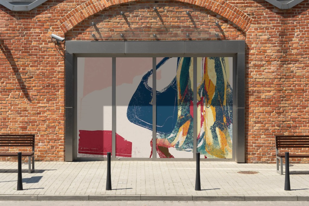 fashion illustration in the windows of a retail store by megan st clair