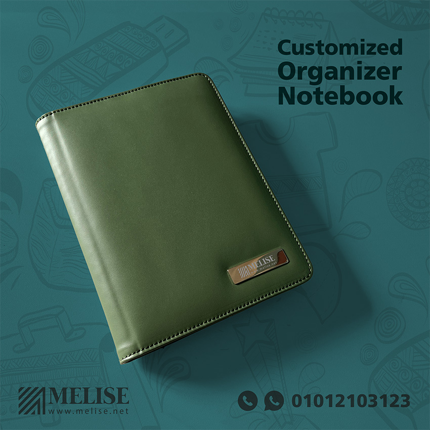 Image of Customized Organizer Notebook by Melise Giveaways Egypt. Customized Leather Organizer Notebook inside paper notebook and pen holder - Engraved logo. Customizable with Engraved logo. An eco-friendly and sustainable choice. Ideal for corporate gifts, promotional giveaways, and branding in Egypt.
