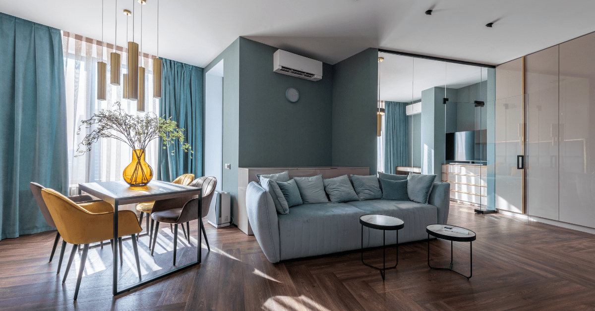 a spacious, modern living room with exquisite furniture