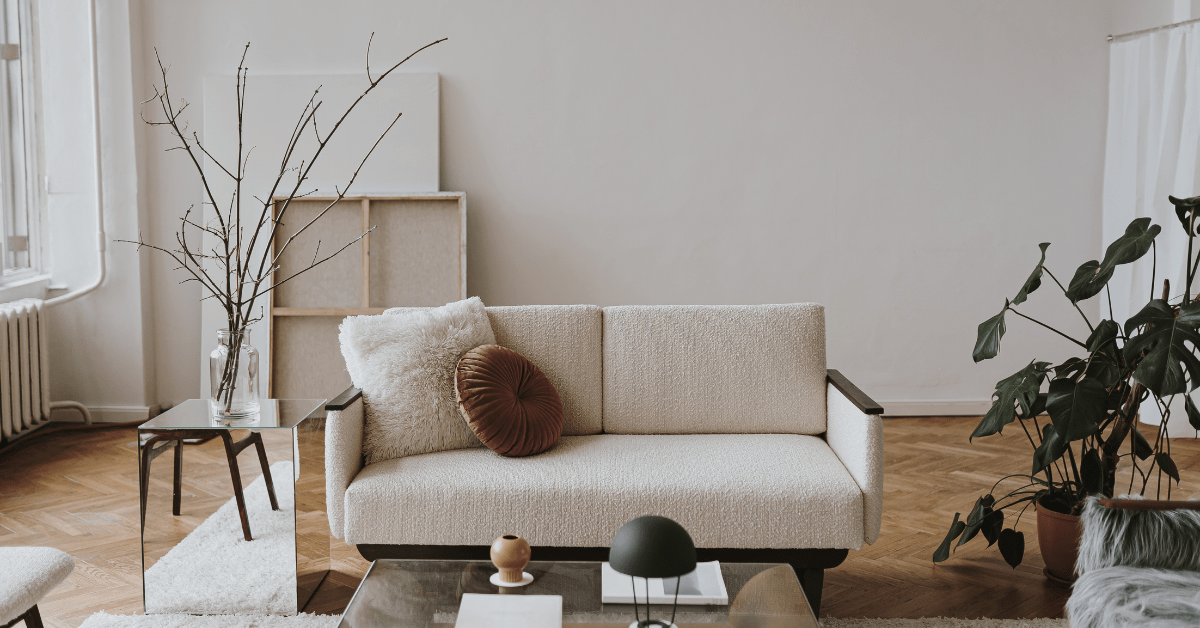a cosy living room with a neutral colour palette