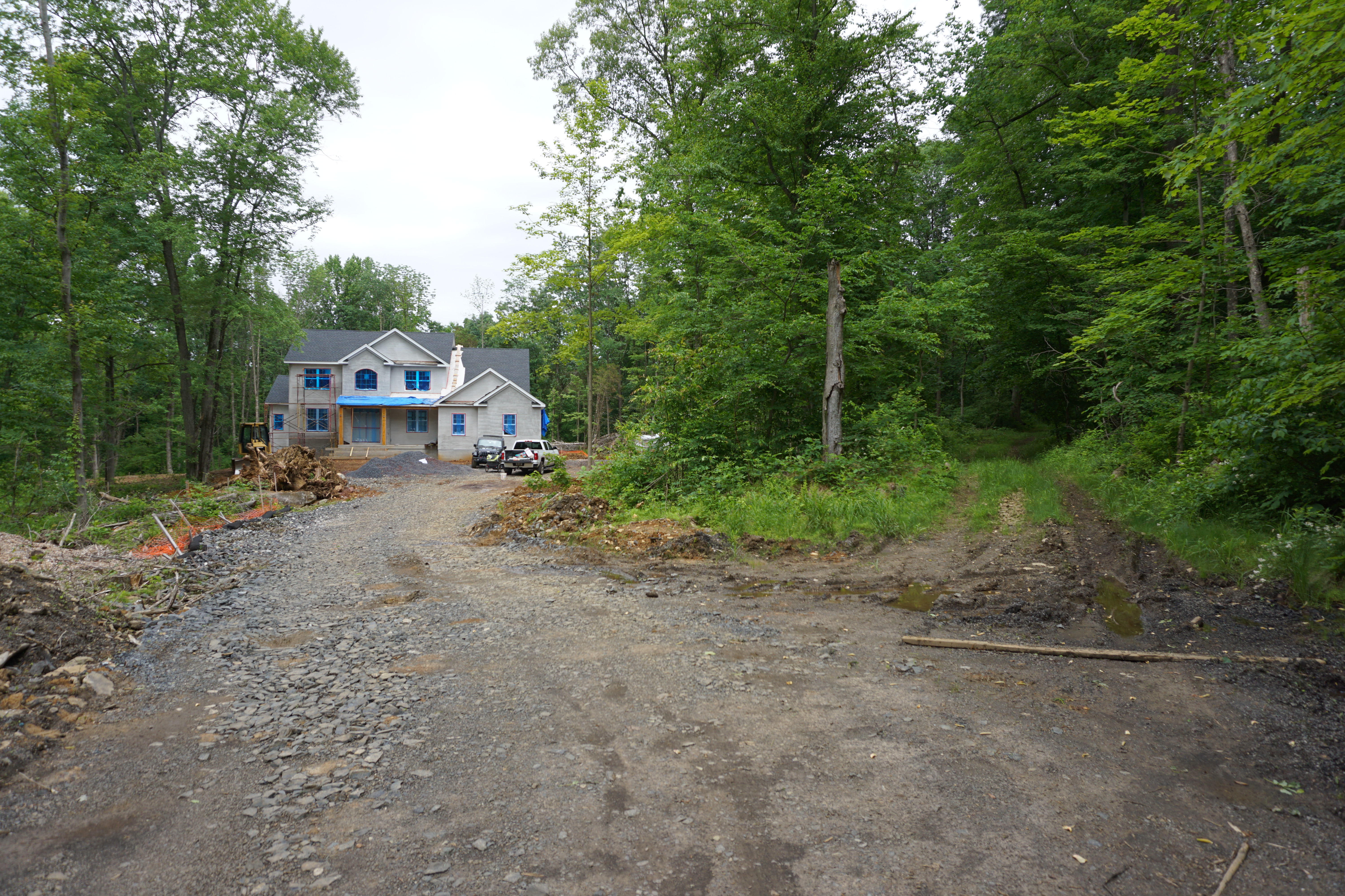House and trail to the right