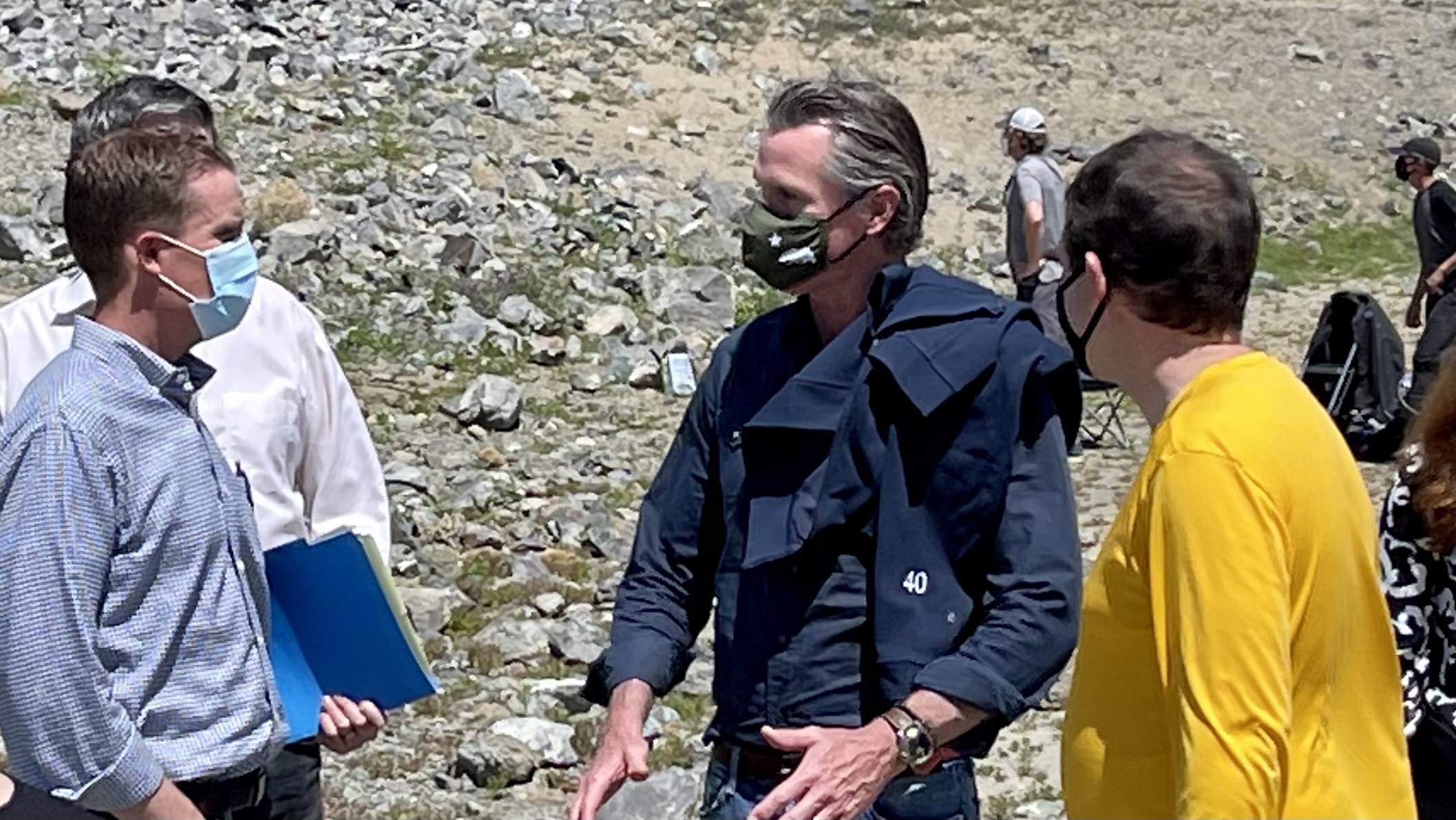 Governor Gavin Newsom speaks with State Senator Mike McGuire and Mendocino County Fifth District Supervisor Ted Williams at Lake Mendocino. (A.F. Baumann / Mendocino Voice)