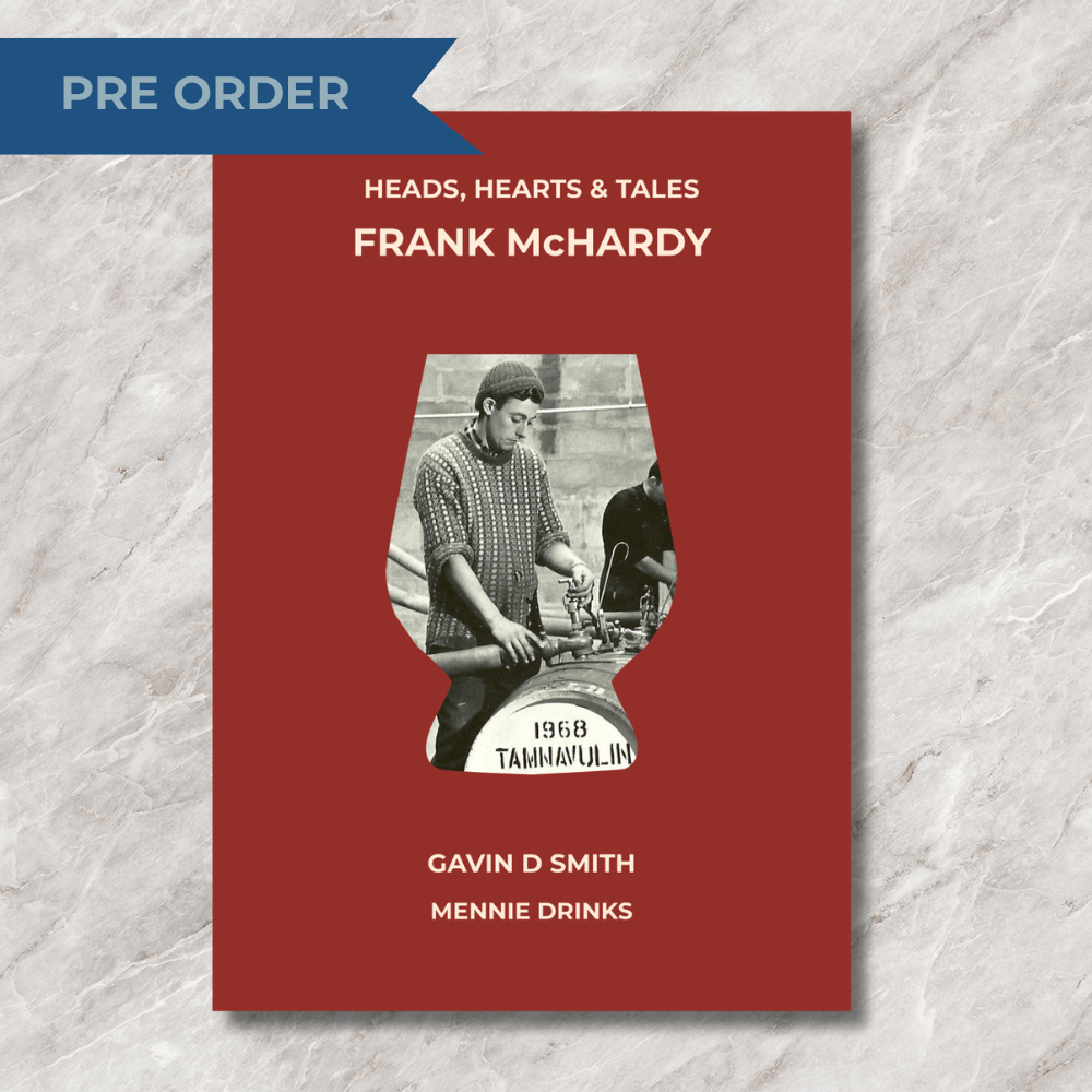 Heads, Hearts & Tales - Frank McHardy chapbook on a granite surface.