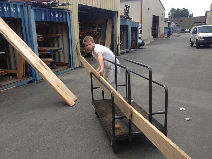 Alex at the Anderson Quaid Co, Inc. purchasing site model wood.