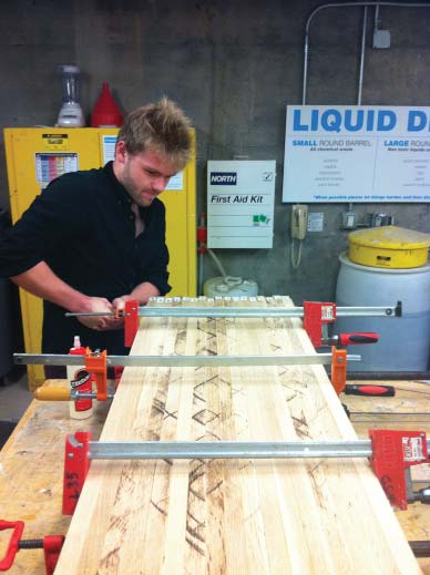 After carefully inspecting the White Oak boards and selecting the desired visual gradient for the adjacent pieces, Alex and Carmine laminated the boards together; first, in groups of three, and then as a final monolithic block.
