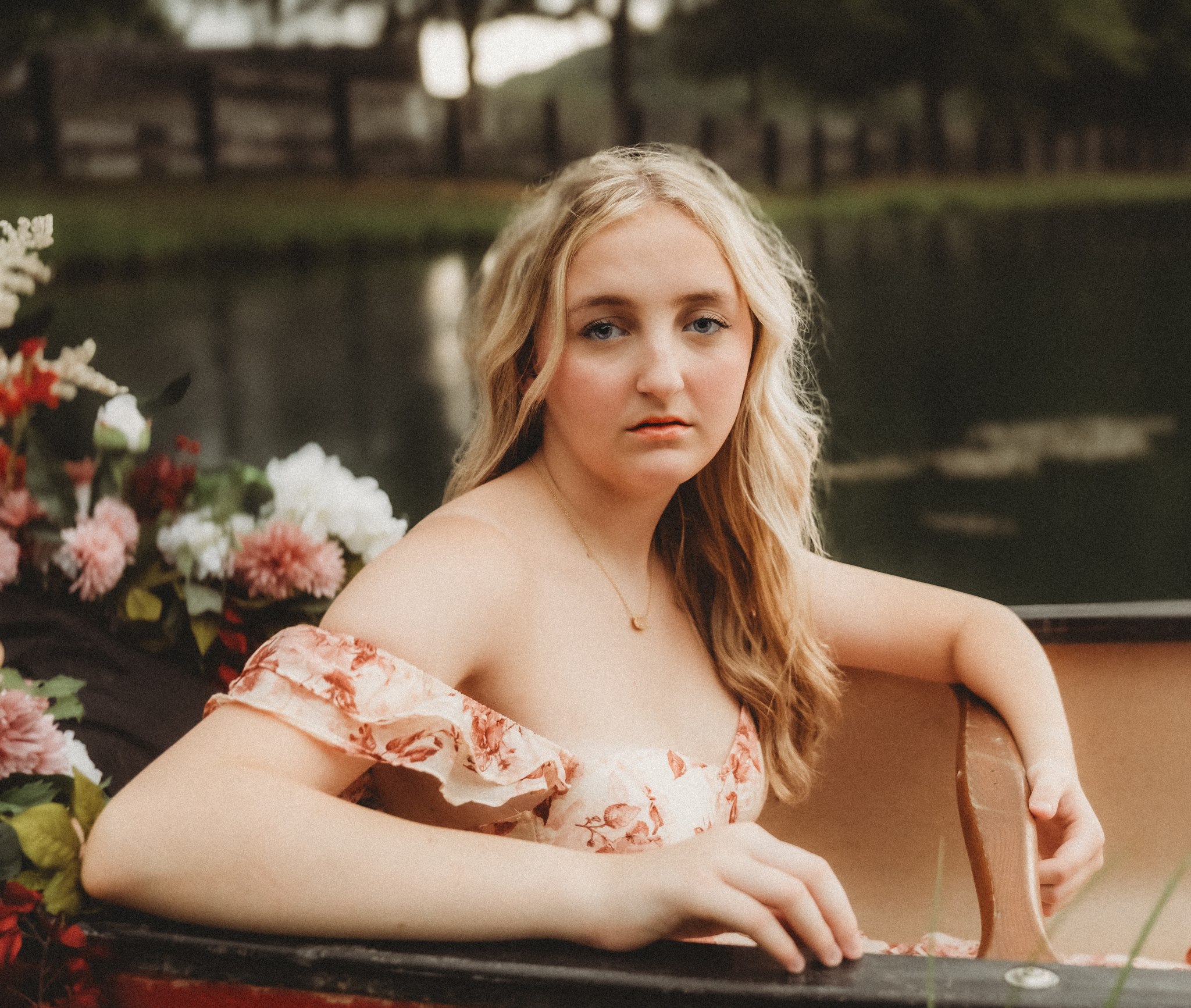 Senior Session Summer night near pond, flowers & canoe