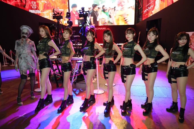 Cosplayers celebrating the final day of Konami’s TGS 2024 booth