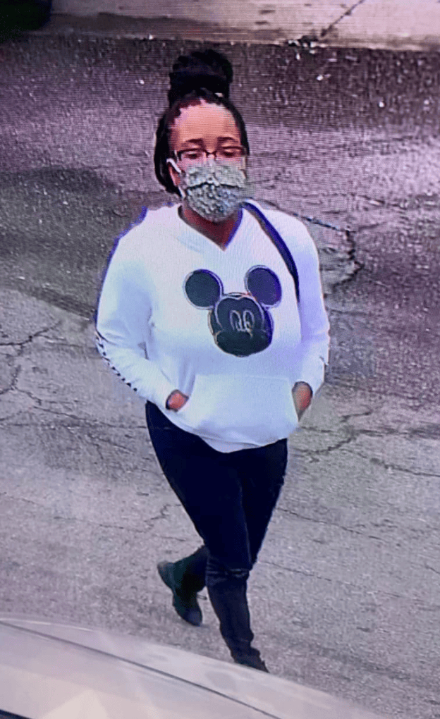 Surveillance grab of woman suspected of being involved in abandoning the child 