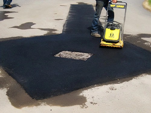 Asphalt patch repair with plate compactor