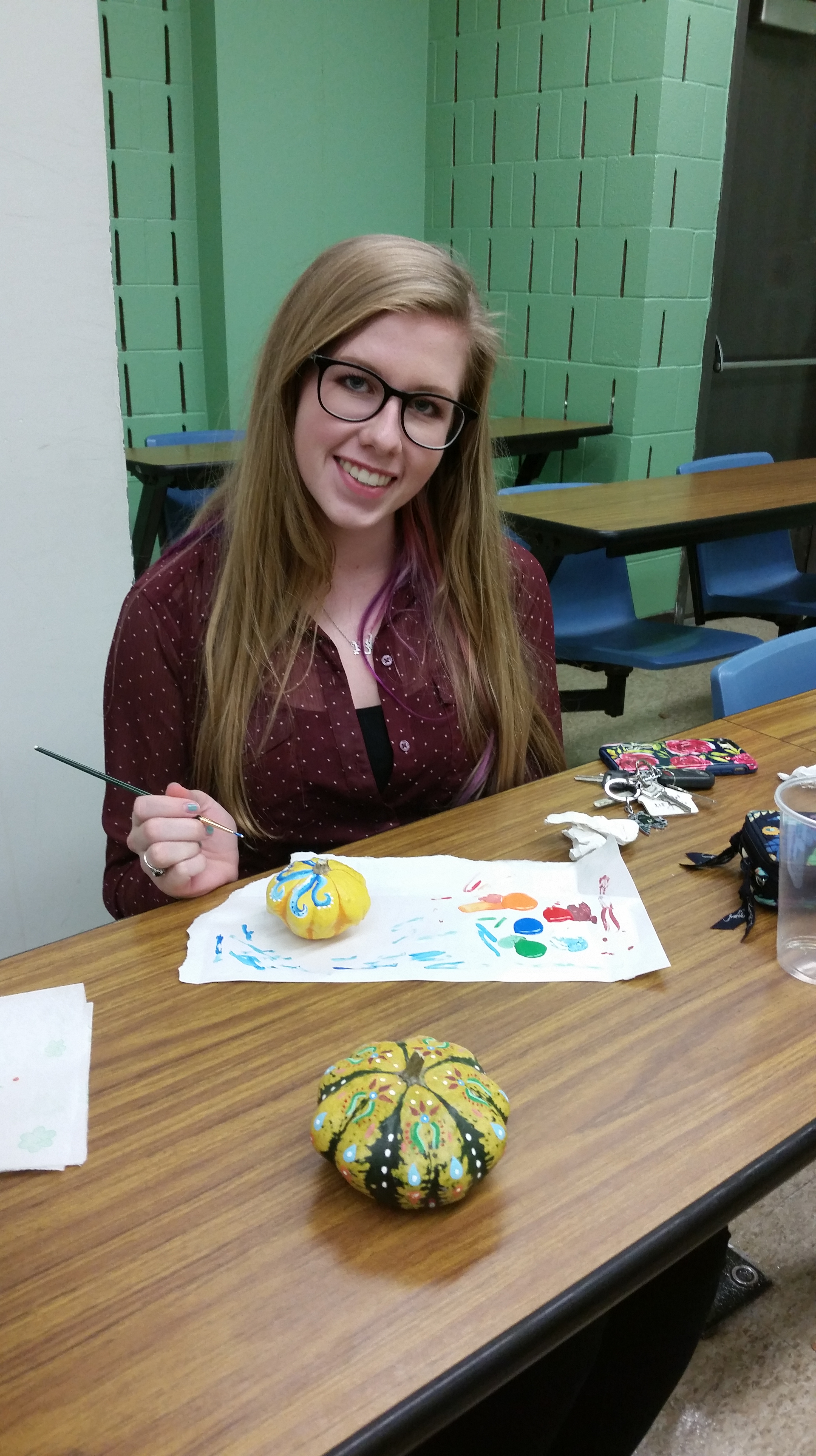 Painting pumpkins for Cypress Manor