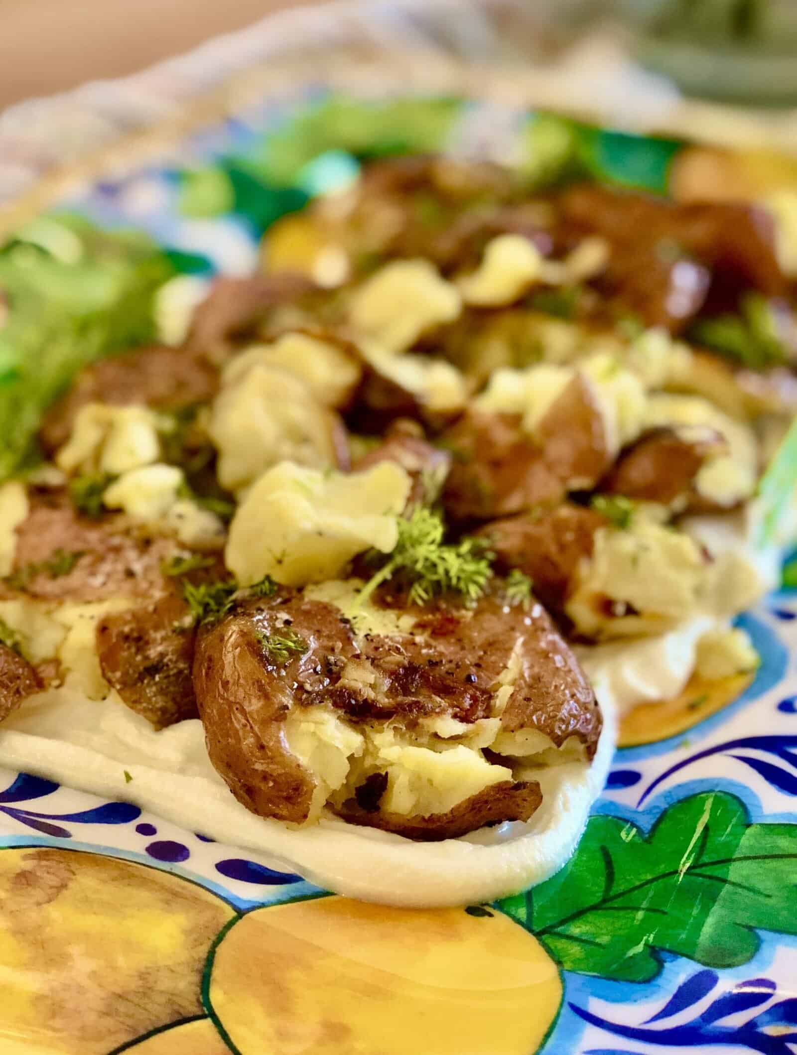 Crispy Smashed Potatoes with Whipped Goat Cheese and Dill