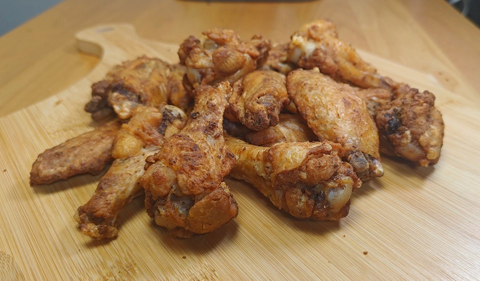 Extra crispy golden chicken wings cooked from frozen in the air fryer