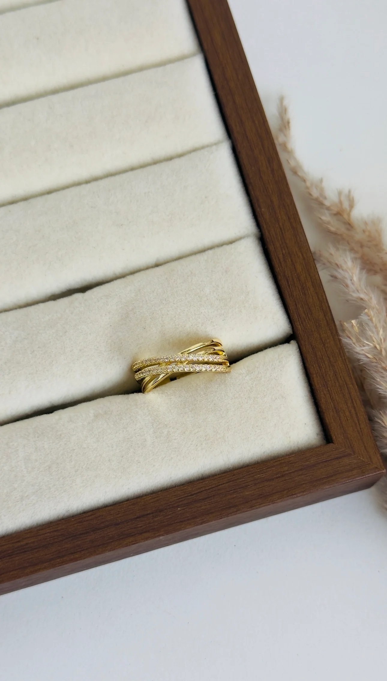 Cross over ring