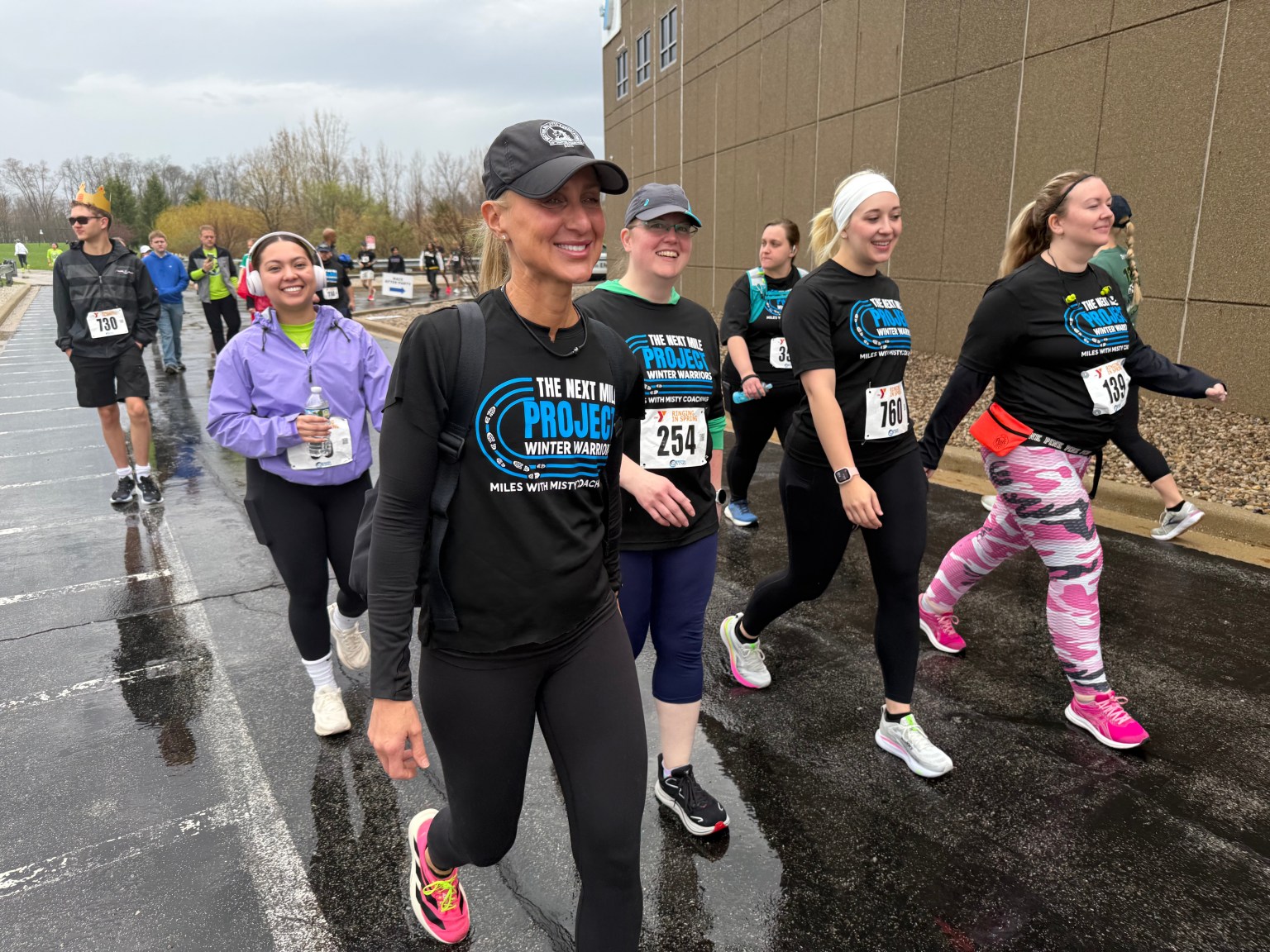 Miles with Misty runners walking together after a race