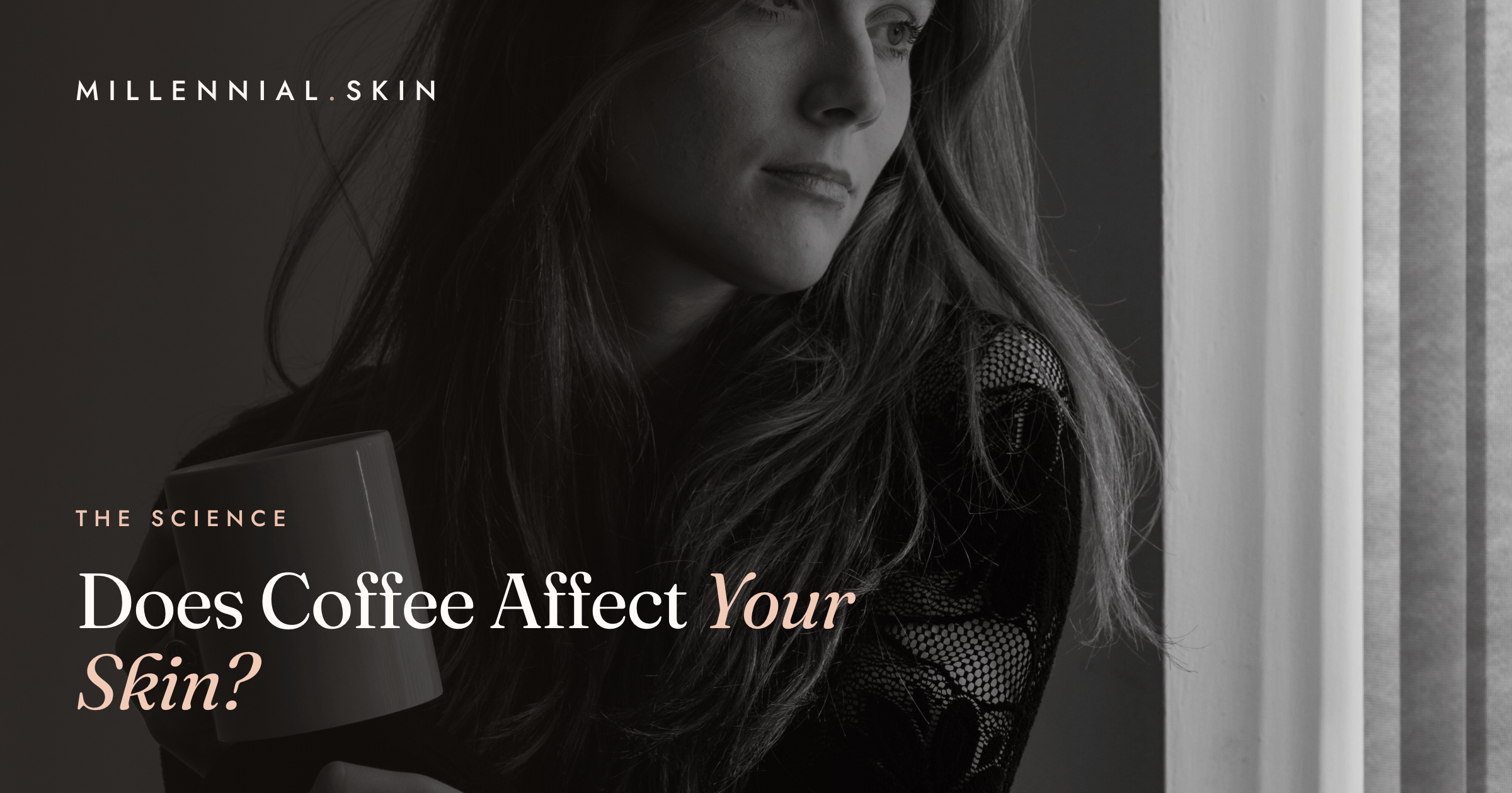 Woman holding a coffee mug by a window