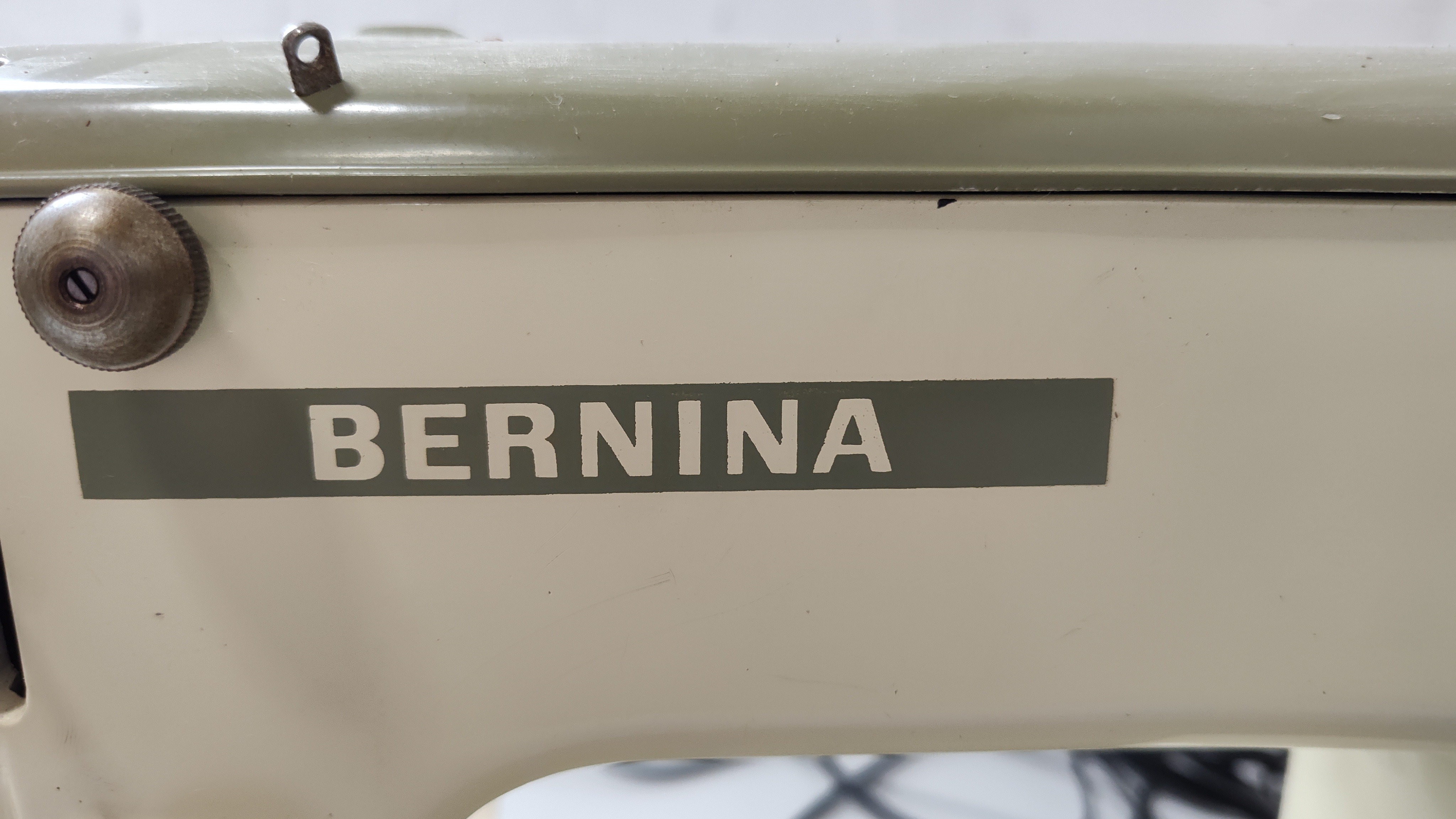 The Bernina logo on a Sewing Machine