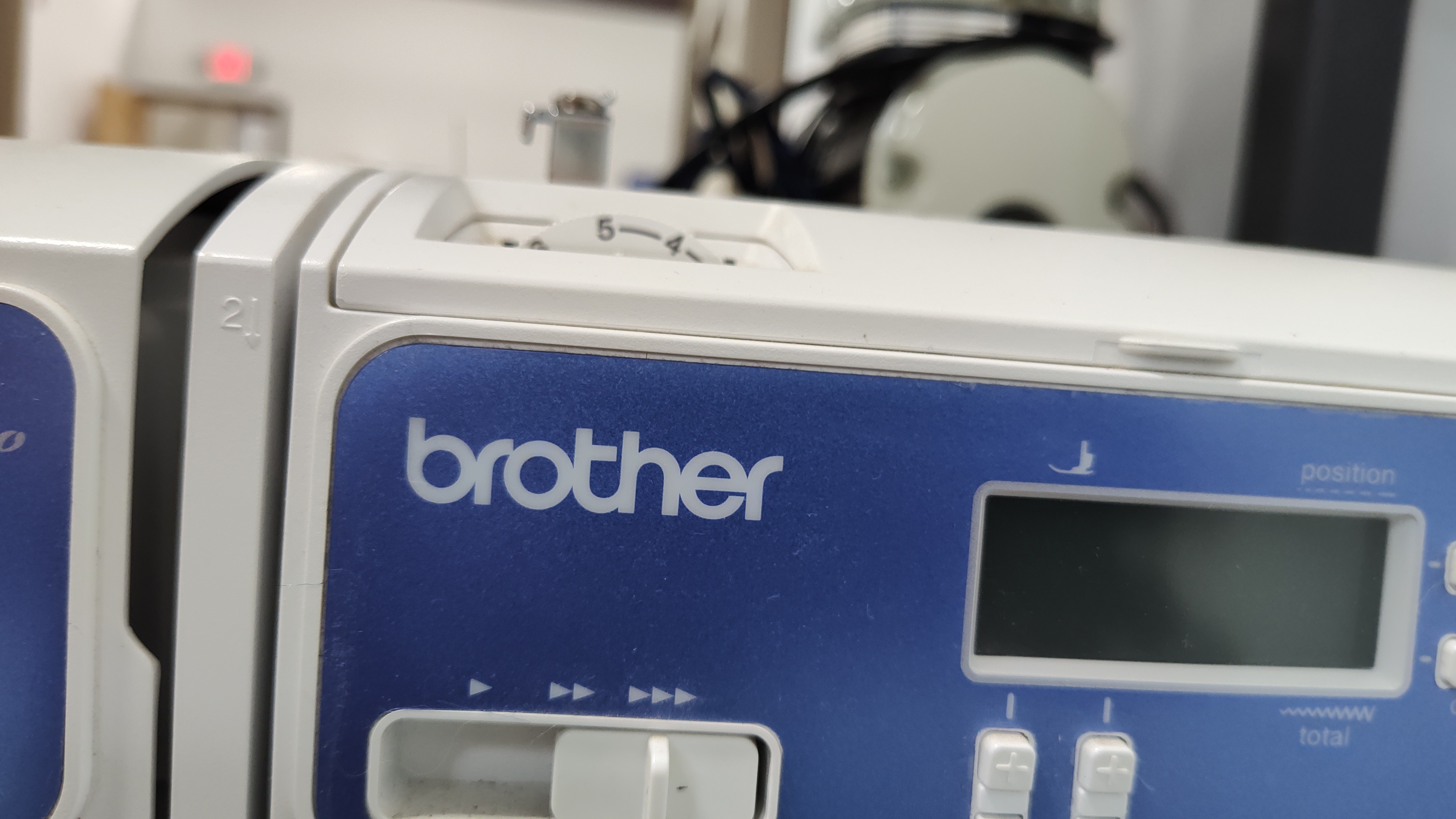 The Brother logo on a Sewing Machine