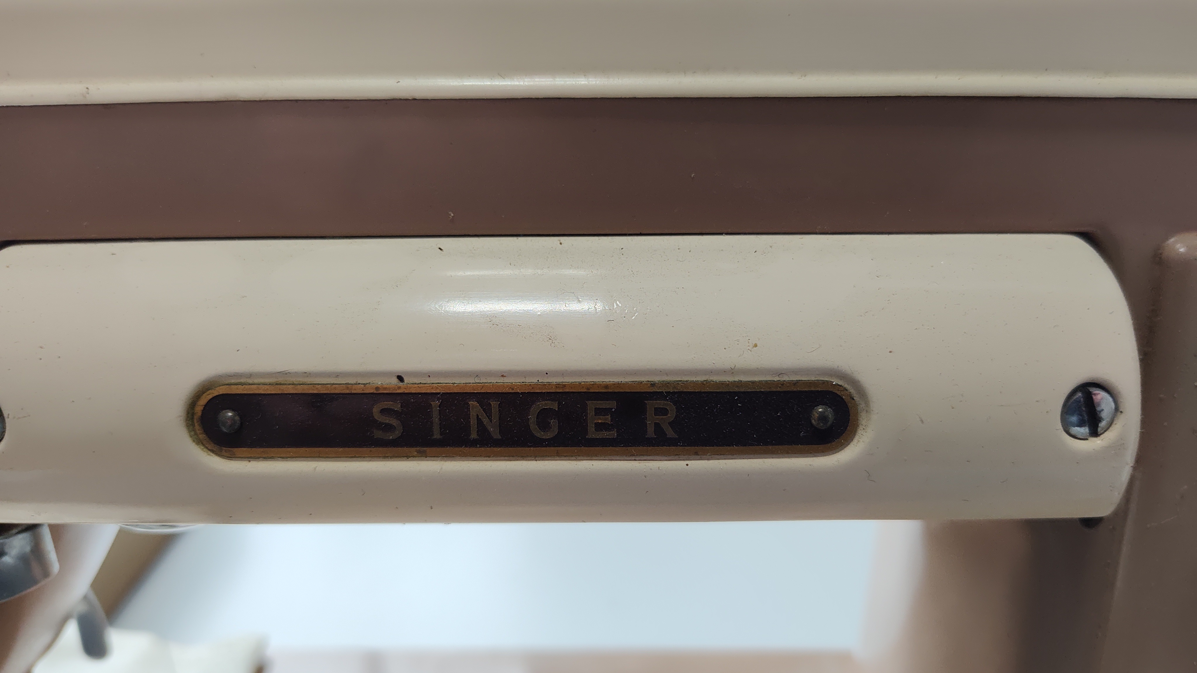 The Singer nameplate on a seewing machine