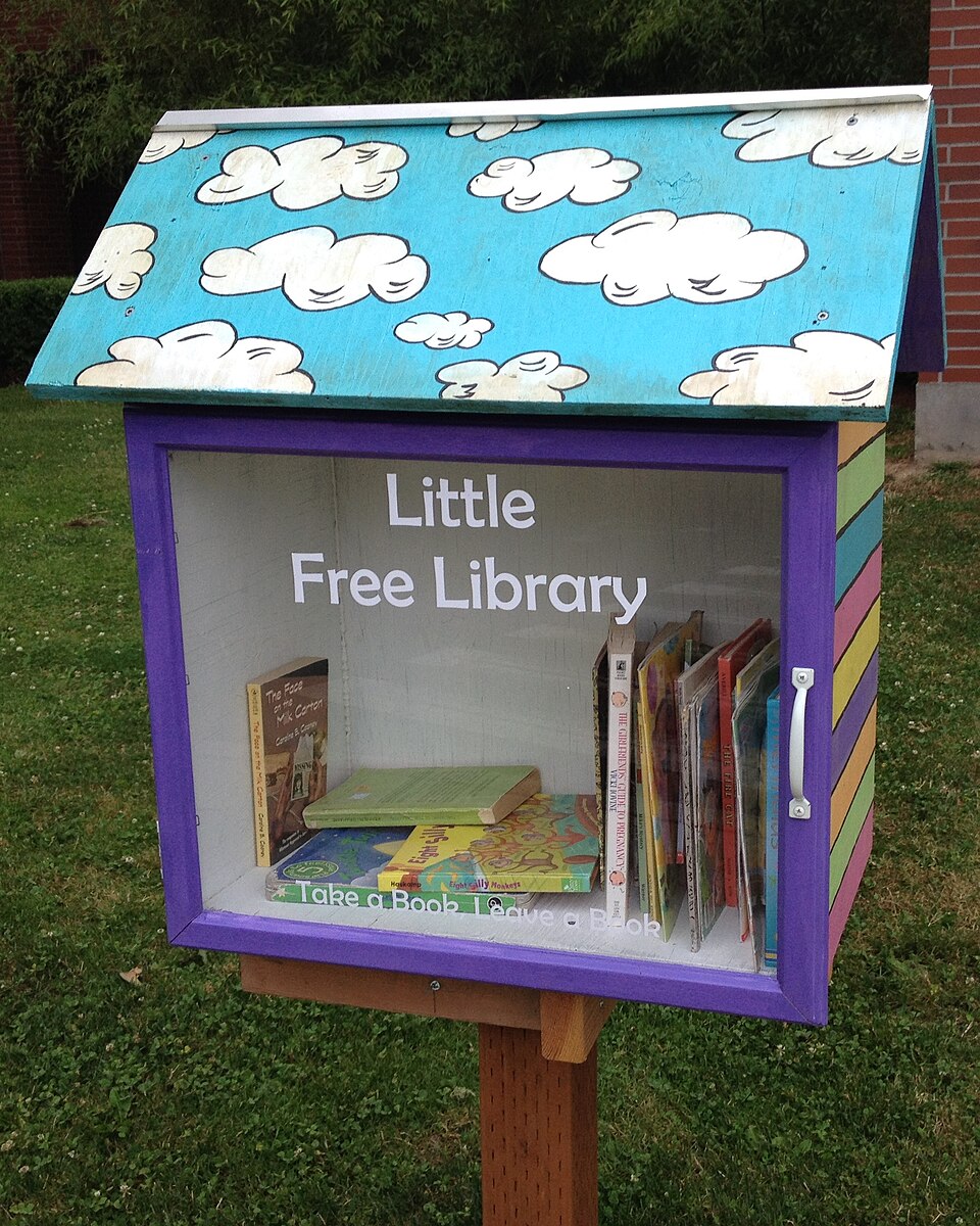 A brightly painted Little Free Library for the Early Learning Community at Pacific University in Berglund Hall, Forest Grove, Oregon, United States