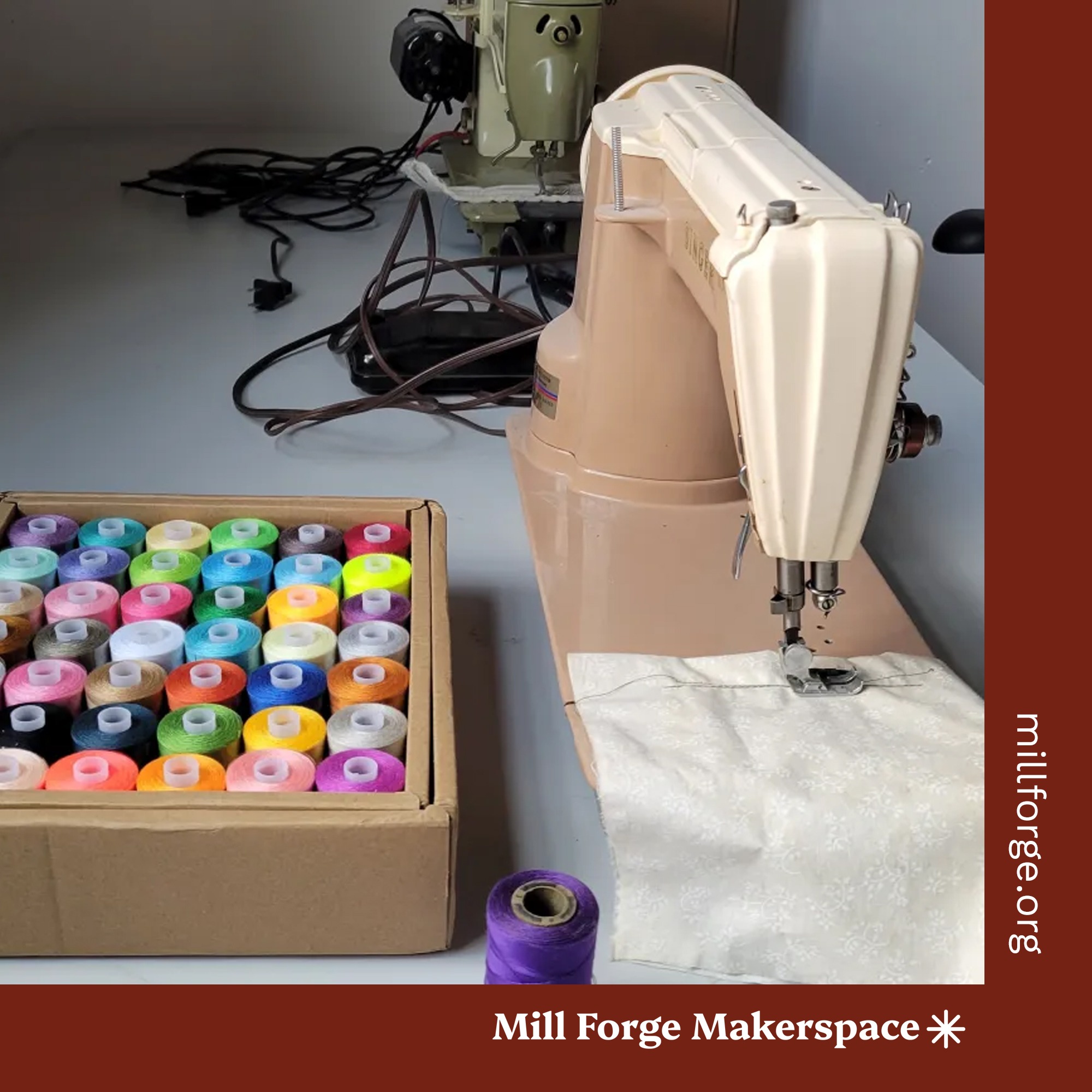 Photograph of a beige sewing machine and basket of bright colored thread.