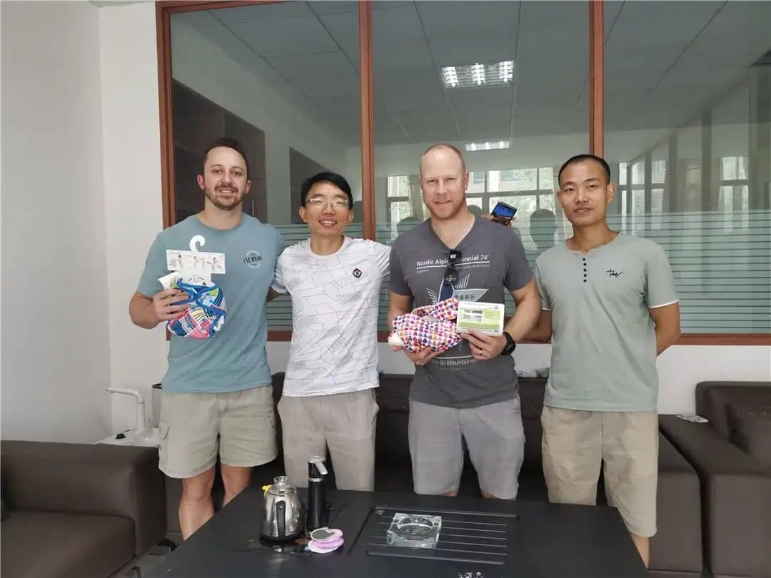 A photo of Minden, a Chinese sourcing agent, with a client.