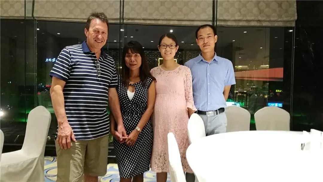 A photo of Minden, a Chinese sourcing agent, with a client.