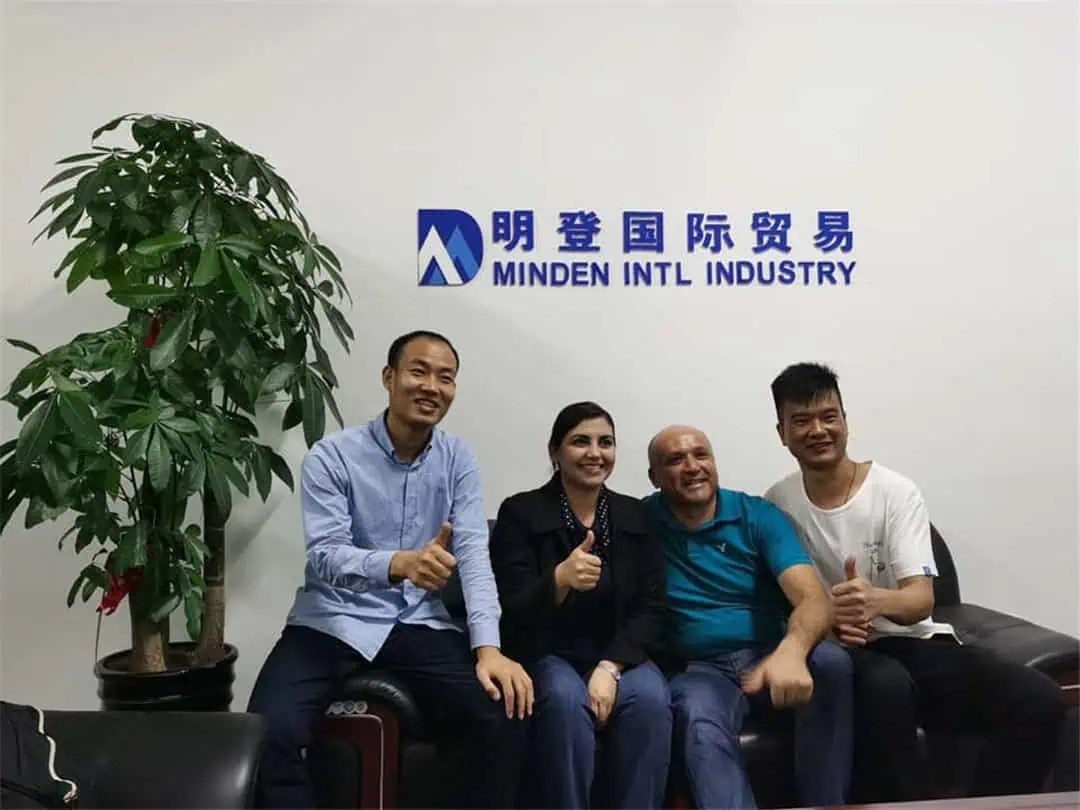 A photo of Minden, a Chinese sourcing agent, with a client.