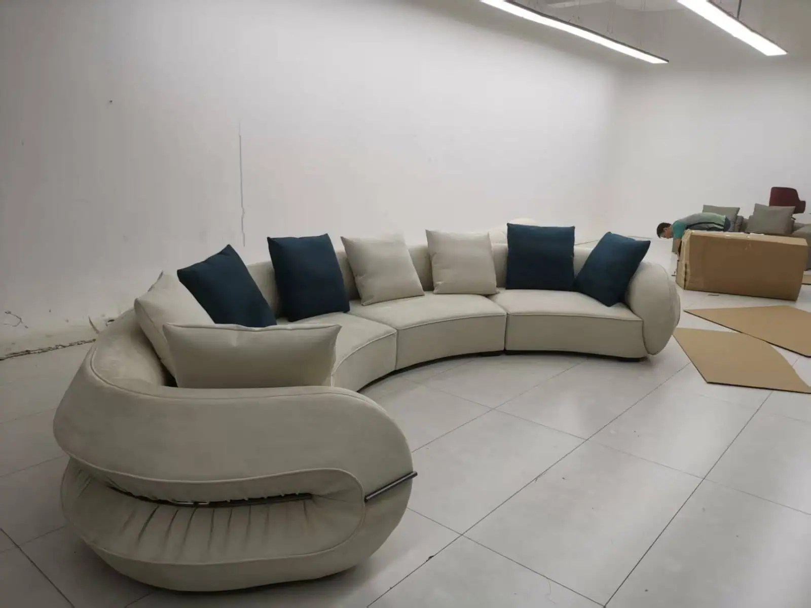 Multi-factory furniture sourcing: finished custom curved sectional sofa after revision rounds at China factory